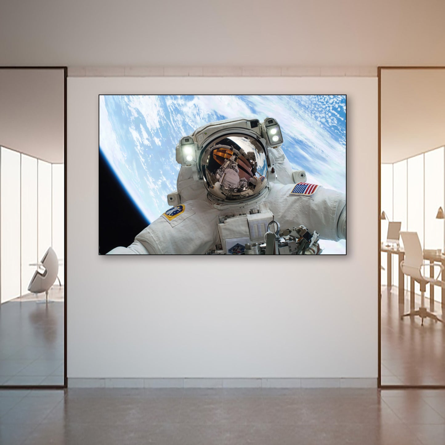 Outer Space Selfie Wall Art – Astronaut Floating Over Earth wall art displayed in modern office space