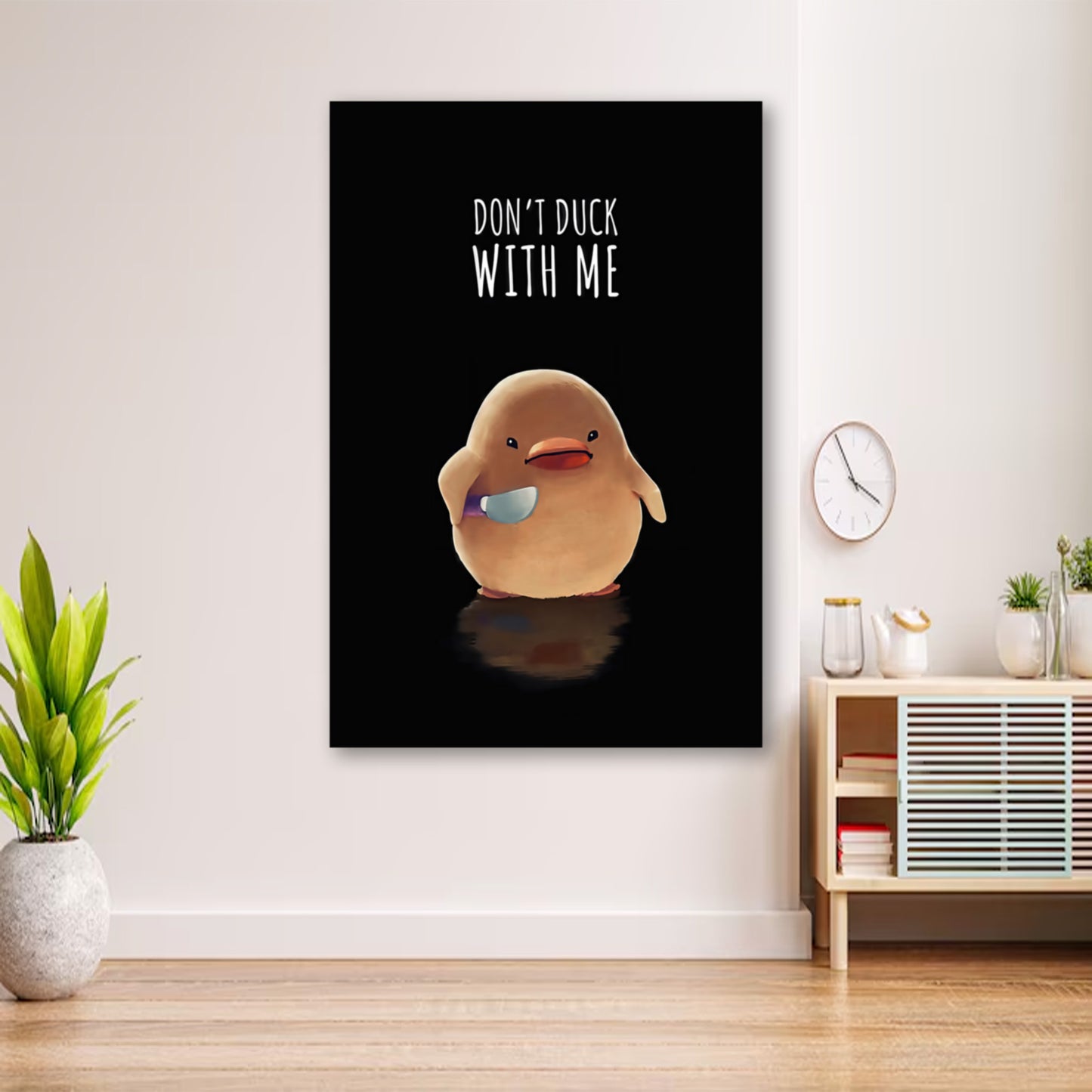 Don’t Duck With Me Poster – Funny Duck with Knife Meme Wall Art wall art displayed in cozy portrait-style interior with minimalist decor
